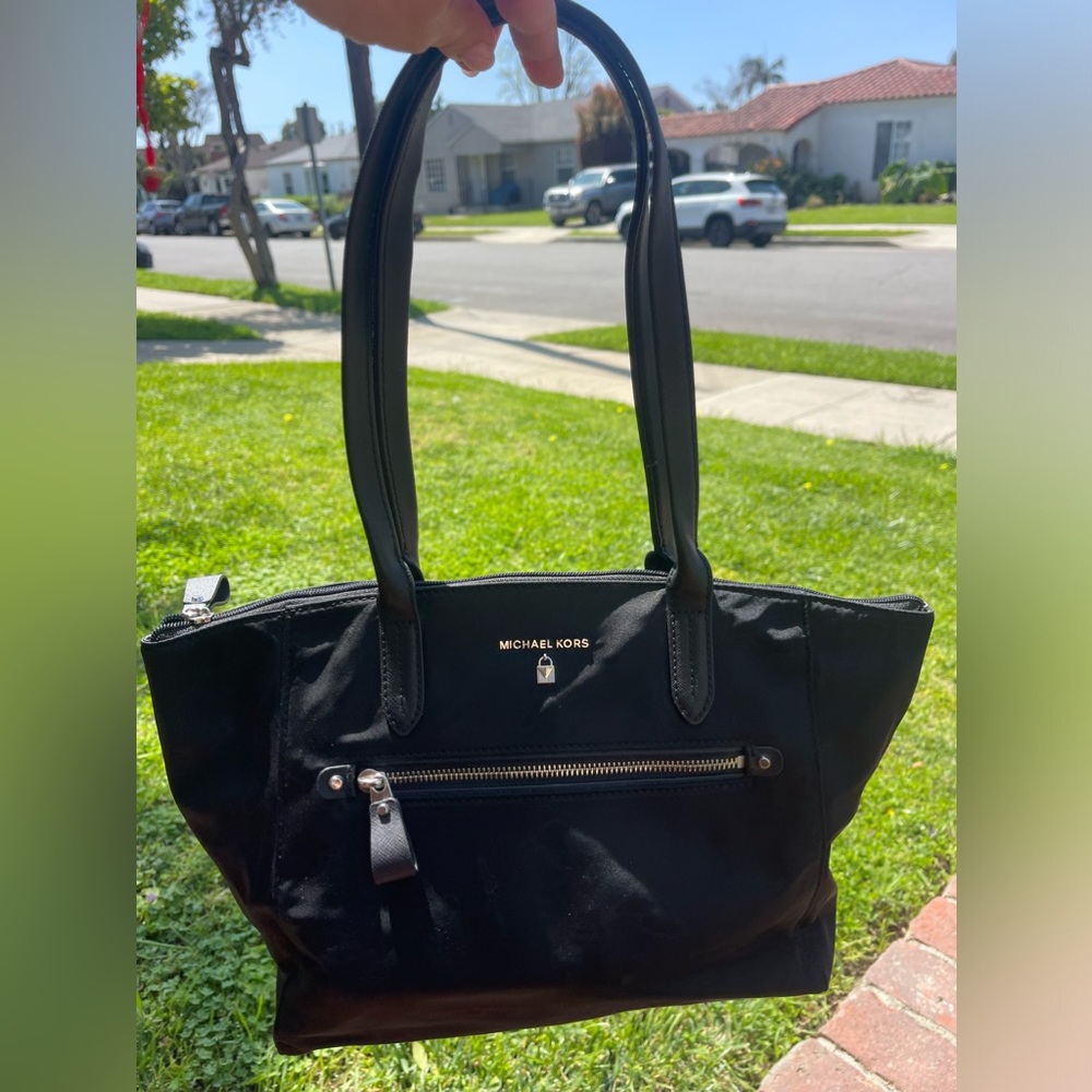 Micheal Kors black waterproof bag
